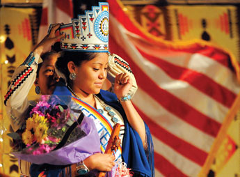 Jerae Curtis is crowned Miss Teen Navajo by her predecessor Alexandria Joe at the Navajo Nation Museum in Window Rock on Saturday. © 2011 Gallup Independent / Adron Gardner 